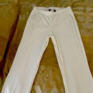 Pants that are tight at the top & flare at bottom